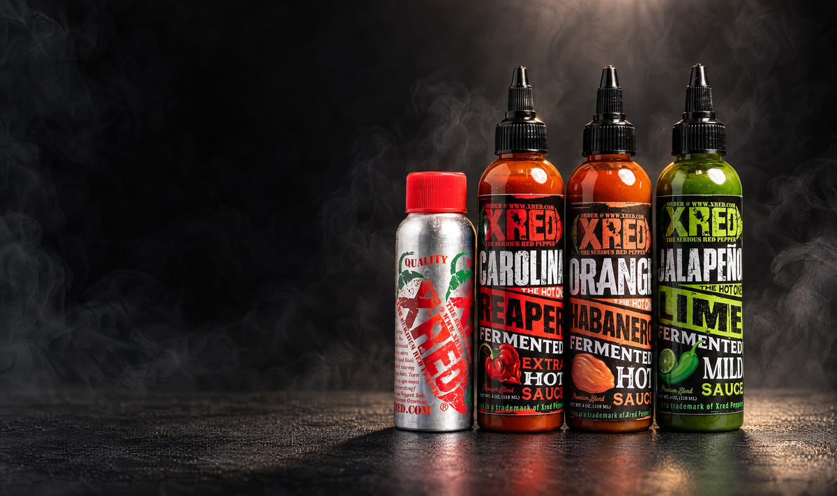 Pouring Xred Carolina Reaper onto tacos